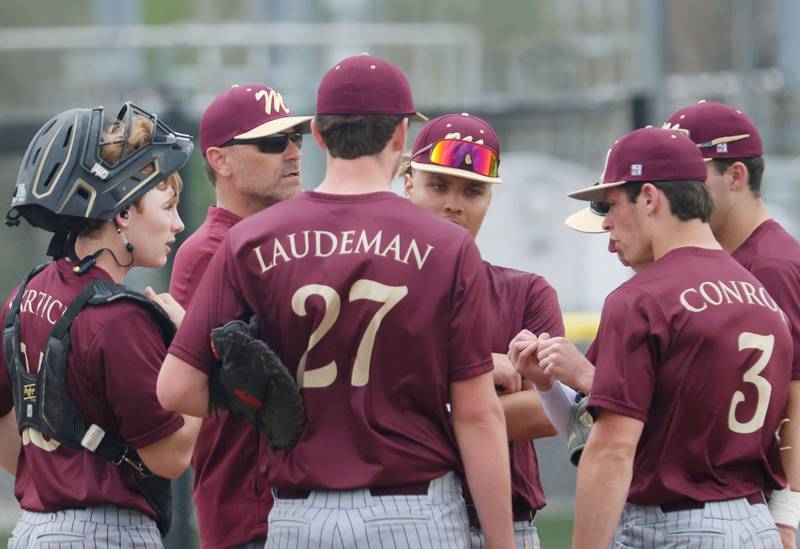 Morris head baseball coach Todd Kein talks to his team on the mound while playing L-P on Friday, April 17, 2026 at Huby Sarver Field in the L-P Athletic Complex in La Salle.