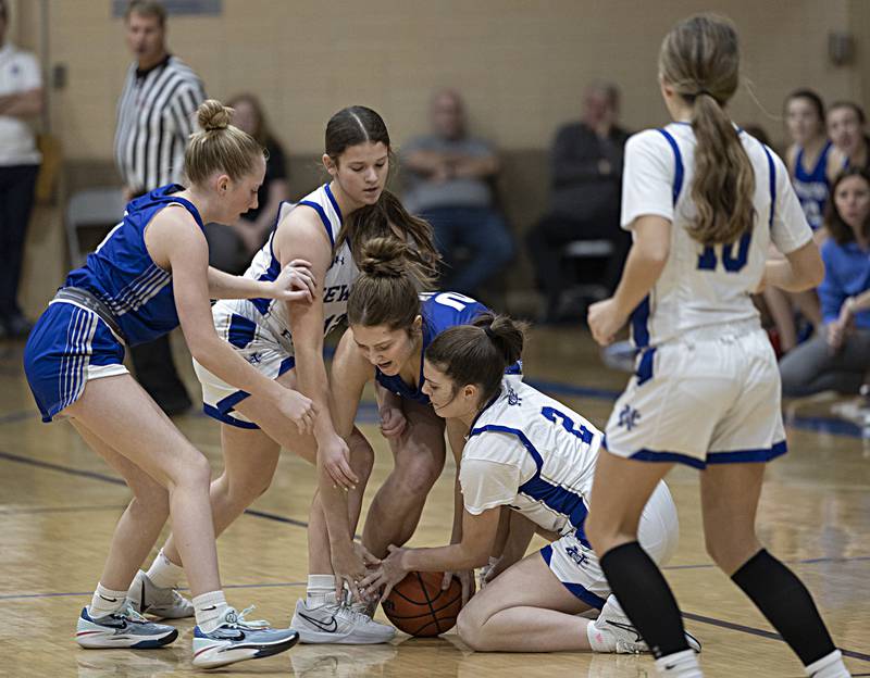 Princeton’s Miyah Fox and Newman’s Helen Papoccia fight for a loose ball Thursday, Dec. 14, 2023 at Newman High School.