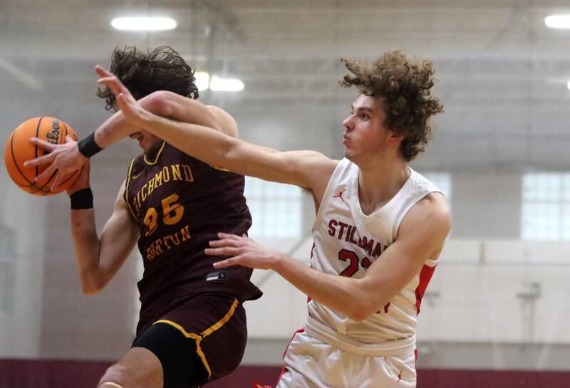 Richmond-Burton’s Matthew Rupnik, left, tussles with Stillman Valley’s Fadi Zatar during 74th Annual E.C. Nichols Holiday Classic varsity boys basketball tournament action on Saturday, Dec. 28, 2024 at Marengo High School in Marengo.