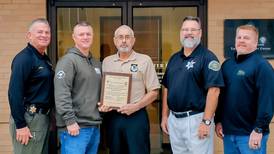 Blue Chevaliers present certificates of appreciation to Morris, Grundy County police 