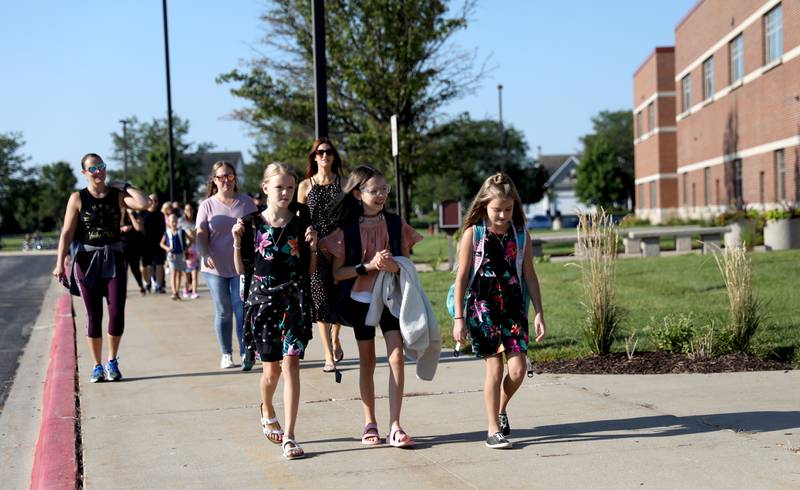 Students arrive for the first day of school at Kaneland Blackberry Creek Elementary School in Elburn on Wednesday, Aug. 17, 2022
