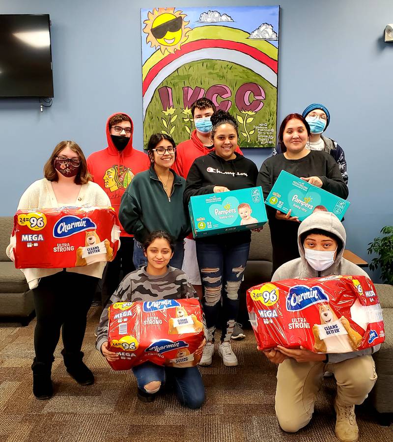 ROE high school completion program students with Ukraine donations at Illinois Valley Community College’s Ottawa Center.