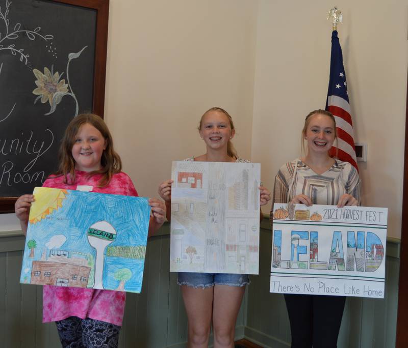 (From left to right) Willow Huntington, Macey Kinney and Malayna Kinney were were named winners of the inaugural Resource Bank Rollo Schoolhouse Art Contest.