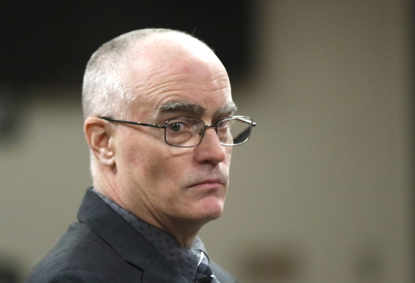 Robert J. Gould, 56, looks back as members of the jury leave the courtroom Monday, Nov. 14, 2022, at the start of his trial before Judge Michael Coppedge. Gould, who was on McHenry County’s most wanted list when arrested in 2017, is accused of repeatedly sexually abusing two children throughout their childhoods beginning in 2001.