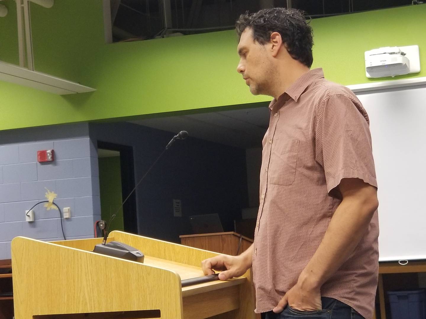 Michael Savitz addresses the Woodstock District 200 school board Tuesday, Aug. 3, 2021, to urge making facial coverings optional in classrooms for the upcoming academic year as officials were set to vote on COVID-19 protocols in schools.