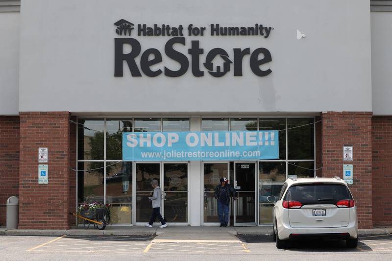 People come out of the Habitat for Humanity ReStore thrift store along Larkin Avenue in Joliet on July, 11th, 2023.