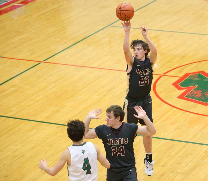 Morris's Brett Bounds shoots a three point basket as teammate Ashton Yard holds off L-P's Jack Jereb from guarding him in Sellett Gymnasium on Friday, Jan. 13, 2023 at L-P High School.