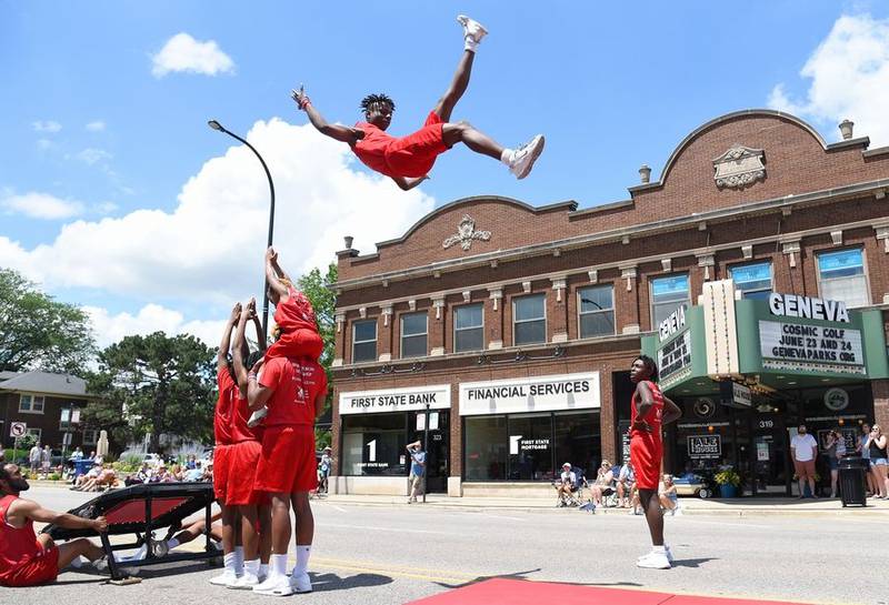 The Jesse White Tumblers take to the air Sunday during Geneva's Swedish Days parade.