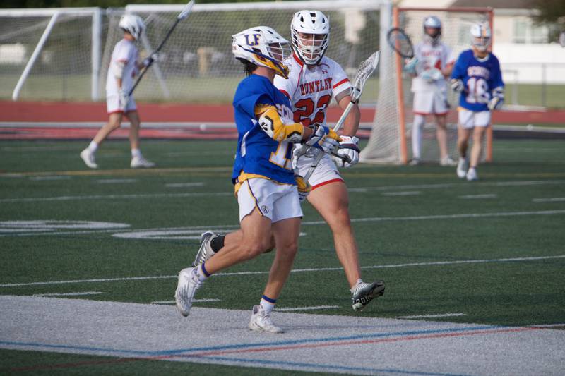 Huntley's Tyler Readinger plays defense against Lake Forest at the Super Sectional Final on Tuesday, May 30, 2023 in Huntley.