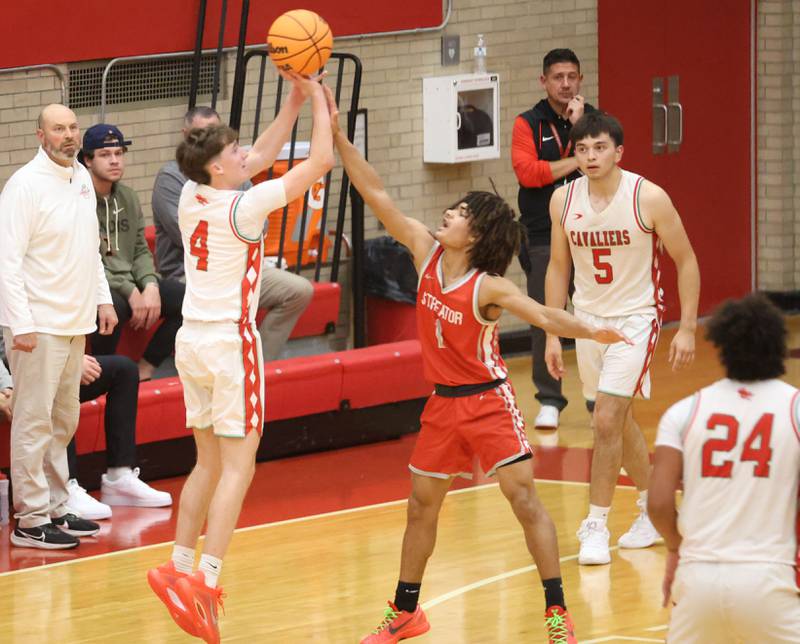 L-P's John Sowers shoots a jump shot over Streator's Layzeric Moton during the Dean Riley Shootin' The Rock Thanksgiving Tournament on Monday Nov. 24, 2025 in Kingman Gymnasium at Ottawa High School.