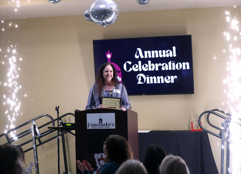 Michelle Groeper from Tails Humane Society speaks after accepting the Nonprofit Organization Award on behalf of Tails Thursday, Feb. 5, 2026, during the DeKalb Chamber of Commerce Annual Celebration Dinner at Faranda's Banquet & Conference Center.