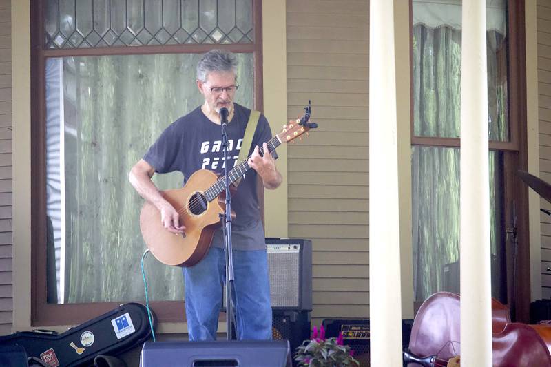 Singer and songwriter Pierce Pettis performs in the 600 block of Western Avenue in Joliet as part of the Porch and Park Music Fest on Saturday, Aug. 16, 2025.