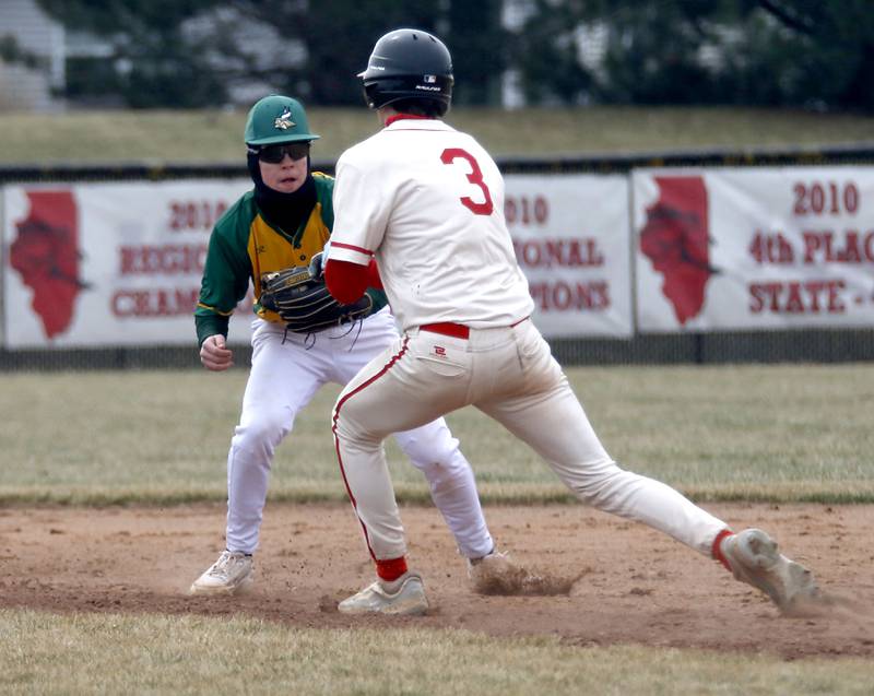 Fremd’s Luke Philipp tags out Huntley's Drew Borkowski during a nonconference baseball game against Fremd on Tuesday, March 24 2026, at Huntley High School.