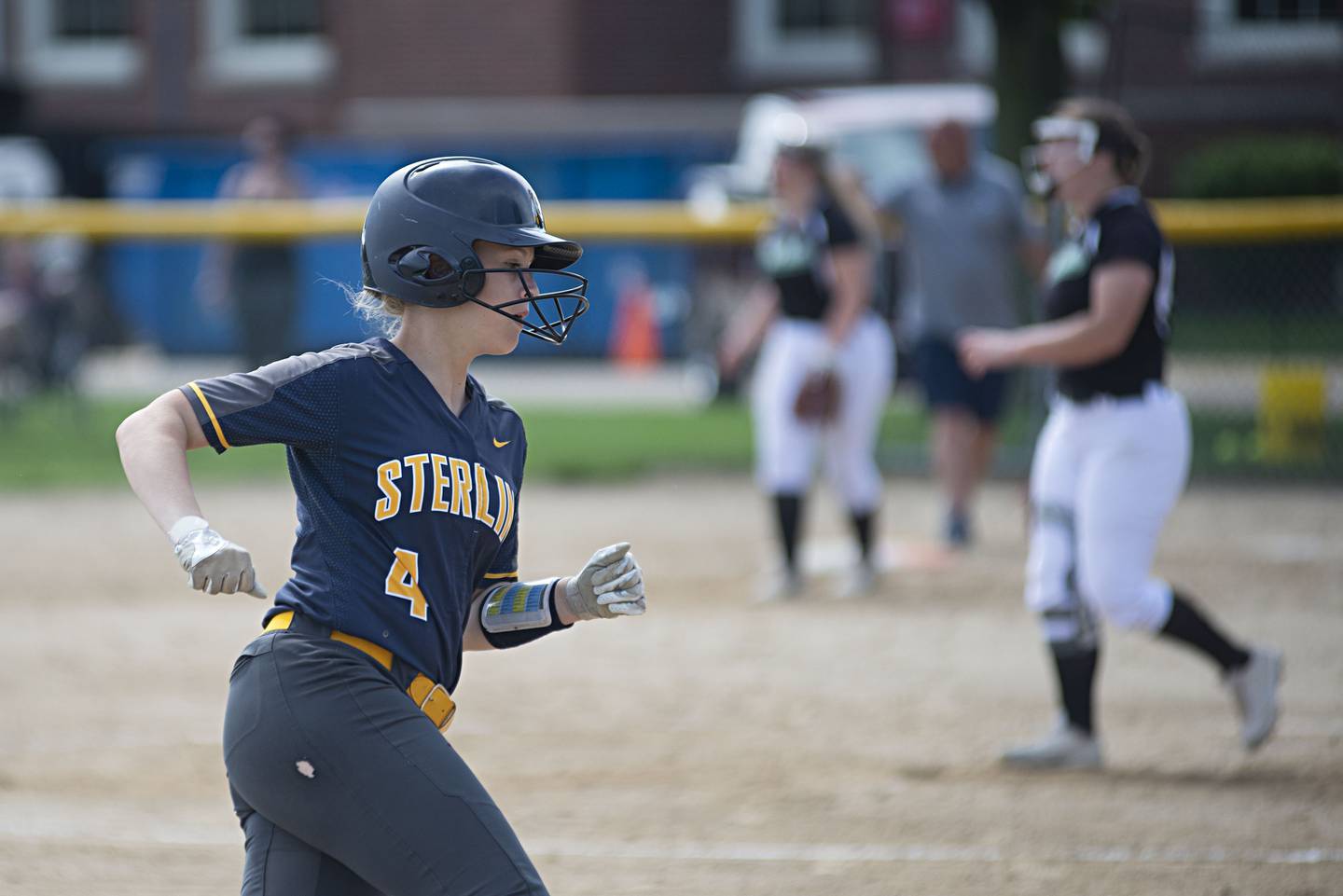 Sterling’s Katie Dittmar rounds third to score against Rock Falls Saturday, May 14, 2022.