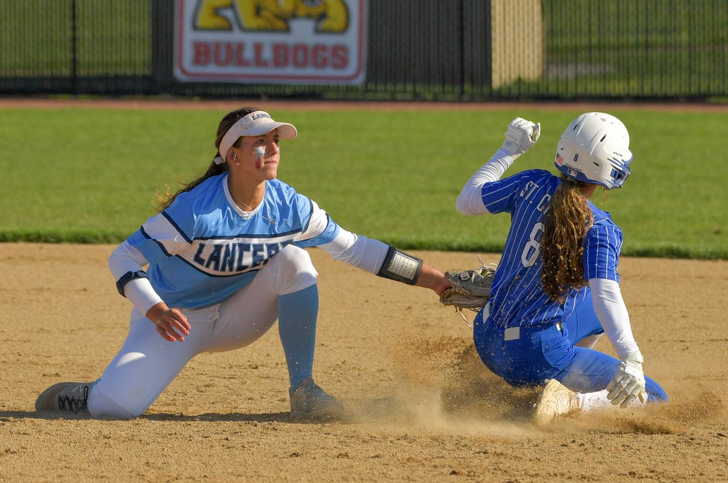 Lake Park's Michela Barbanente (1) makes the tag on St. Charles North's Ginger Ritter (8) for the out during a game in St Charles on Friday, April 21, 2023.