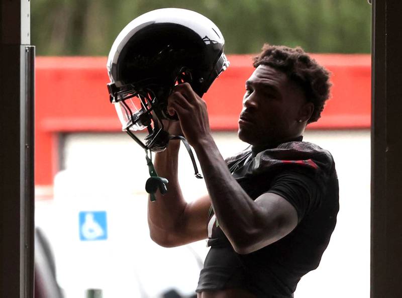 Northern Illinois’ Gary Givens gets ready for a drill Wednesday, July 30, 2025, at the teams first practice of the season in the Chessick Practice Center at NIU in DeKalb.