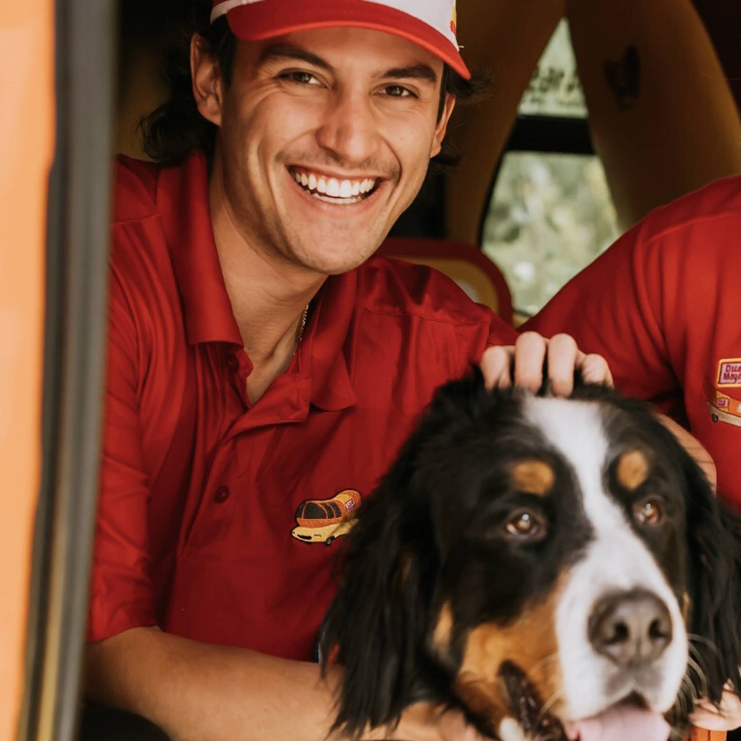 Brandon Mazzaferro, of Crystal Lake, is pictured as the driver of the Oscar Mayer Wienermobile with Parker the Snow Dog, honorary Mayor of Georgetown, Colorado.