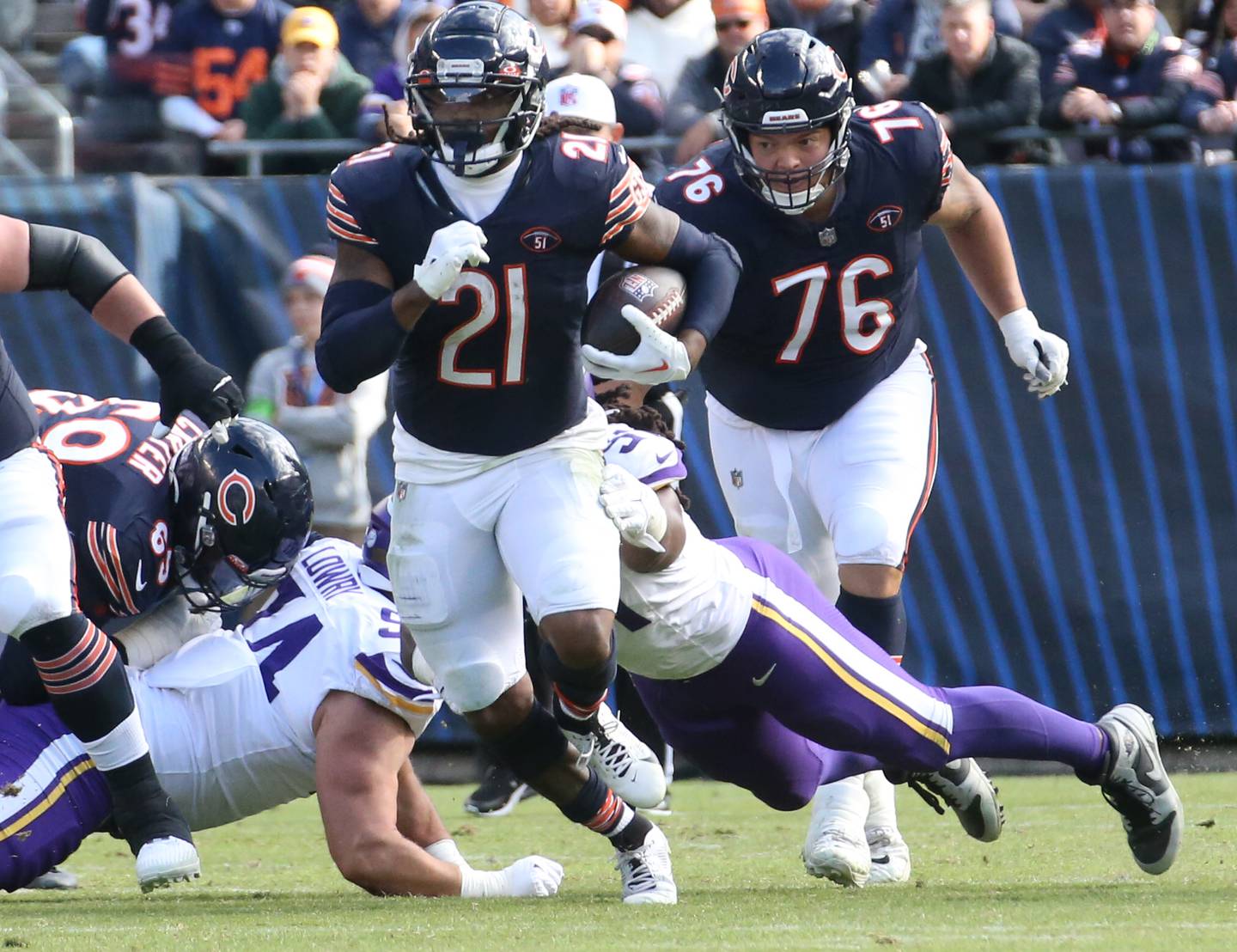 Chicago Bears running back D'Onta Foreman runs the ball against the Minnesota Vikings on Sunday, Oct. 15, 2023 at Soldier Field.