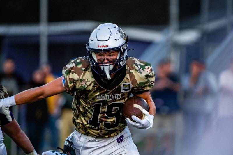 Wilmingtons Colin James runs the ball during a game against Coal City  Friday, Sept. 9, 2022 ,at Wilmington High School