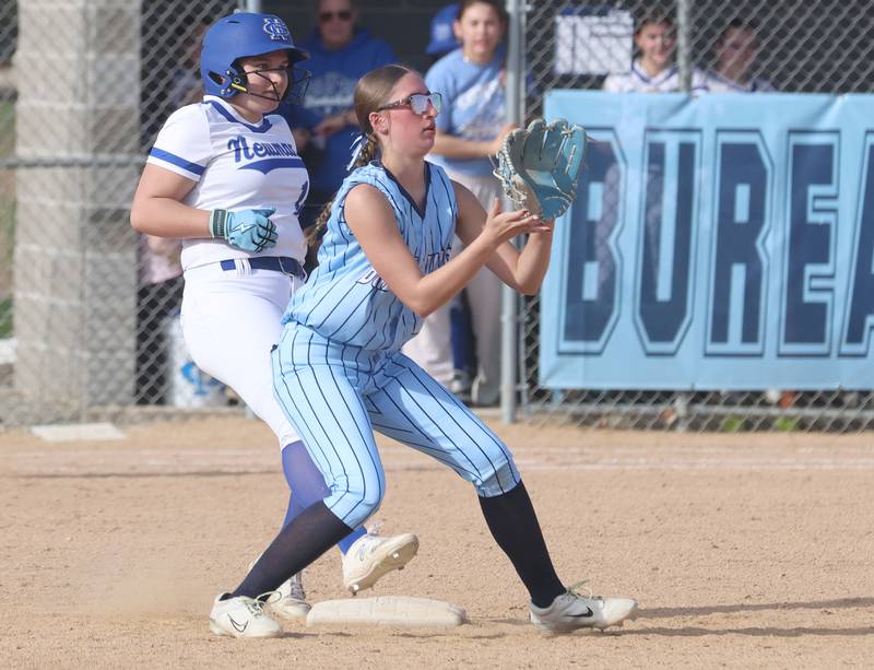 Newman's Violet Anderson steps on second base as Bureau Valley's Danicka Benavidez waits for the late throw on Monday, March 30, 2026 at Bureau Valley High School.