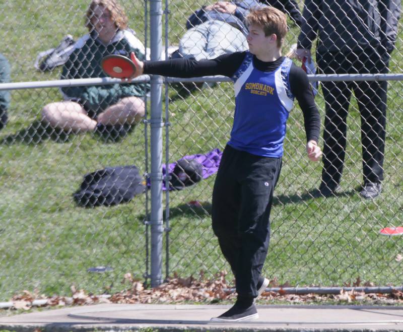 Somonauk's Peyton Penman throws discus during the Rollie Morris Invite on Saturday, April 16, 2022 at Hall High School in Spring Valley.