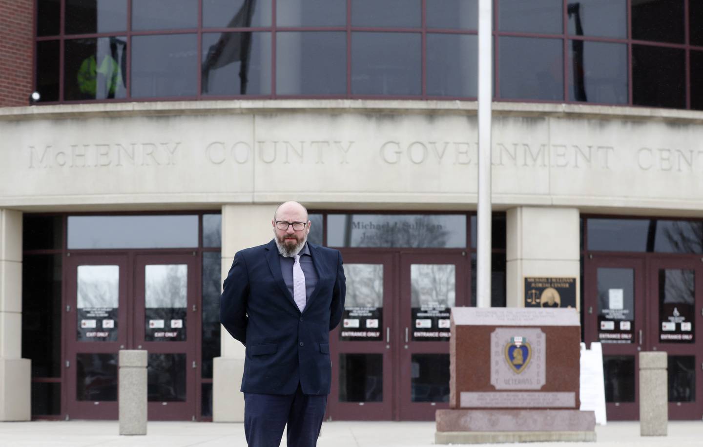 Attorney Michael "Mick" Combs outside the McHenry County Government Center on Wednesday, Dec. 21, 2022. Twenty years ago, 17-year-old Brian Carrick disappeared and was presumed murdered. He was last seen in the Val's Finer Foods in Johnsburg on Dec. 20, 2002. Combs was the prosecutor who tried Mario Casciaro, who was arrested and charged with murder by intimidation, but his conviction overturned on appeal.