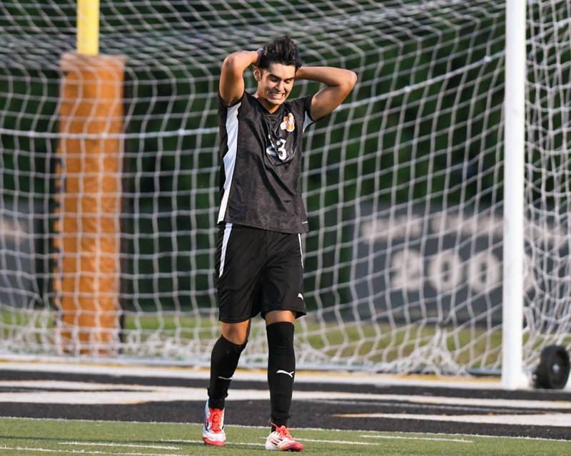 Wheaton Warrenville South's Joaqujin Martinez (23) reacts after missing a goal during the game on Thursday Sept. 11, 2025, held at Wheaton Warrenville South.