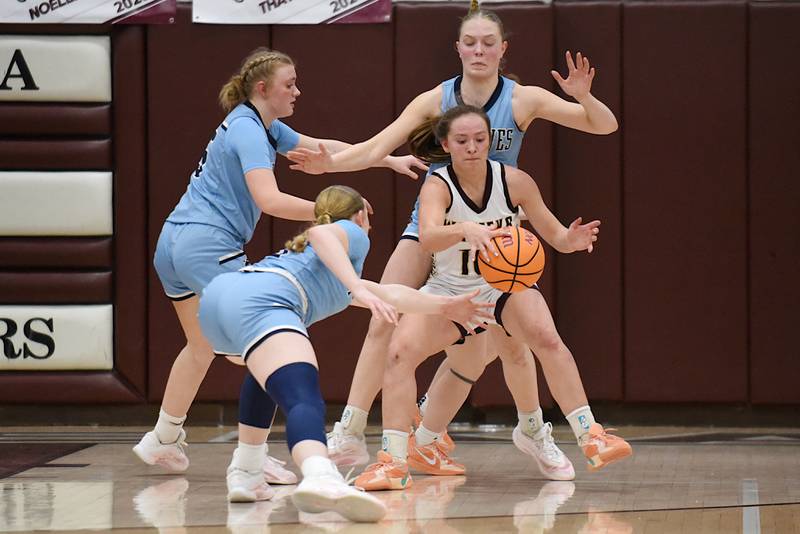 A trio of Cissna Park defenders key in on Watseka/Milford's Christa Holohan, bottom right, during a game at Watseka Monday, Feb. 9, 2026.