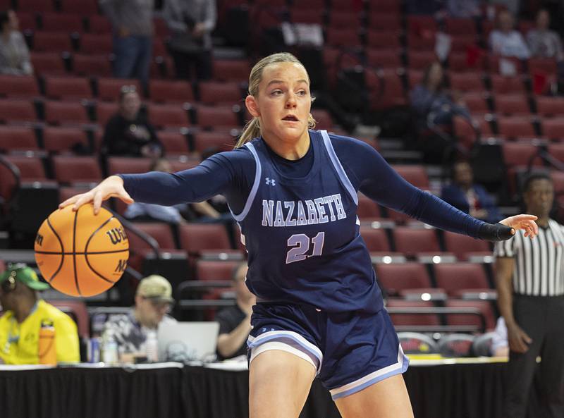 Nazareth’s Lyla Shelton saves a loose ball against Belleville East Friday, March 6, 2026, in the Class 4A girls state semifinal game at CEFCU Arena at ISU.