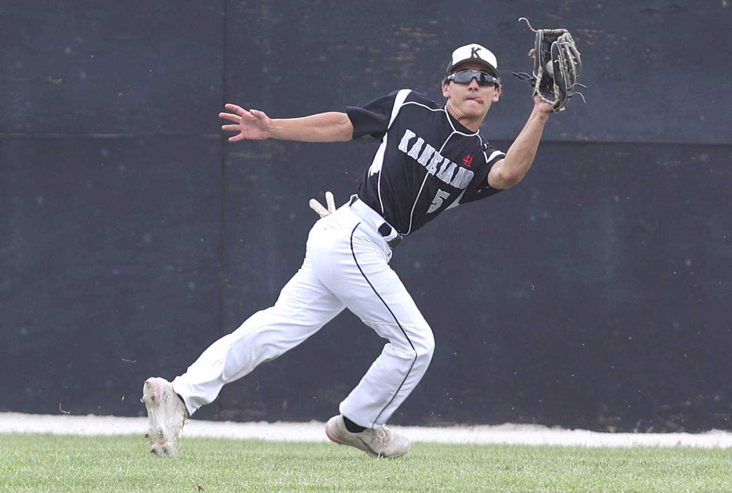 Kaneland's Alex Panico makes a catch in the outfield Saturday, June 4, 2022, during their IHSA Class 3A Sectional final game against Sycamore at the Sycamore Community Sports Complex.