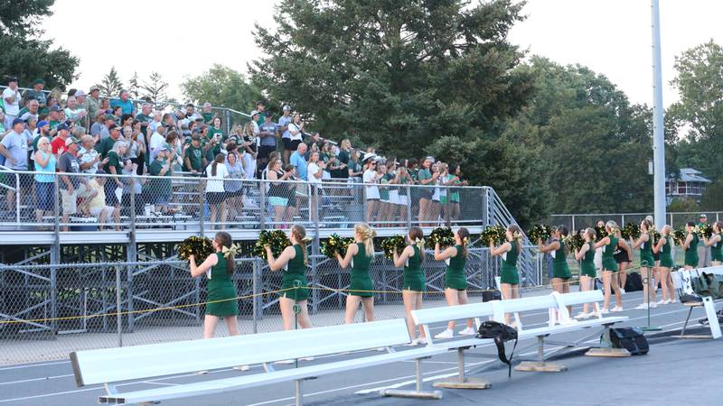 St. Bede football fans and cheerleaders cheer on the Bruins as they play Tuscola on Friday, Aug. 25, 2023 at Tucci Stadium  in Bloomington.
