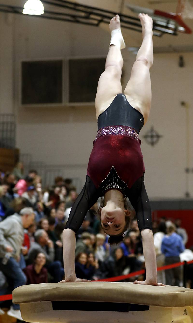 Prairie Ridge’s Tess Morton competes on the vault during the IHSA Mundelein Gymnastics Sectional on Feb. 13, 2025, at Mundelein High School.