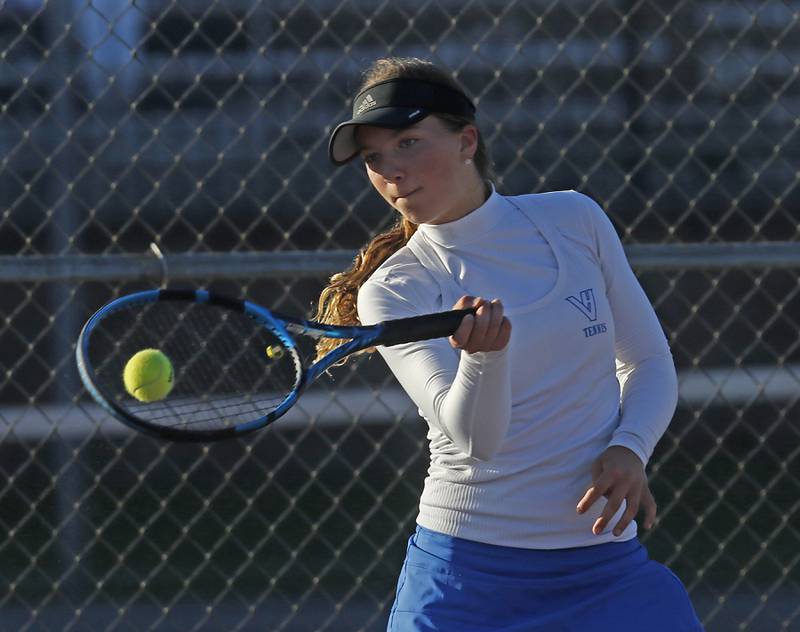 Vernon Hill’s Emma Jazbutis returns the ball Thursday, Oct. 23, 2025, during the first day of the IHSA State Girls Tennis Tournament at Schaumburg High School.