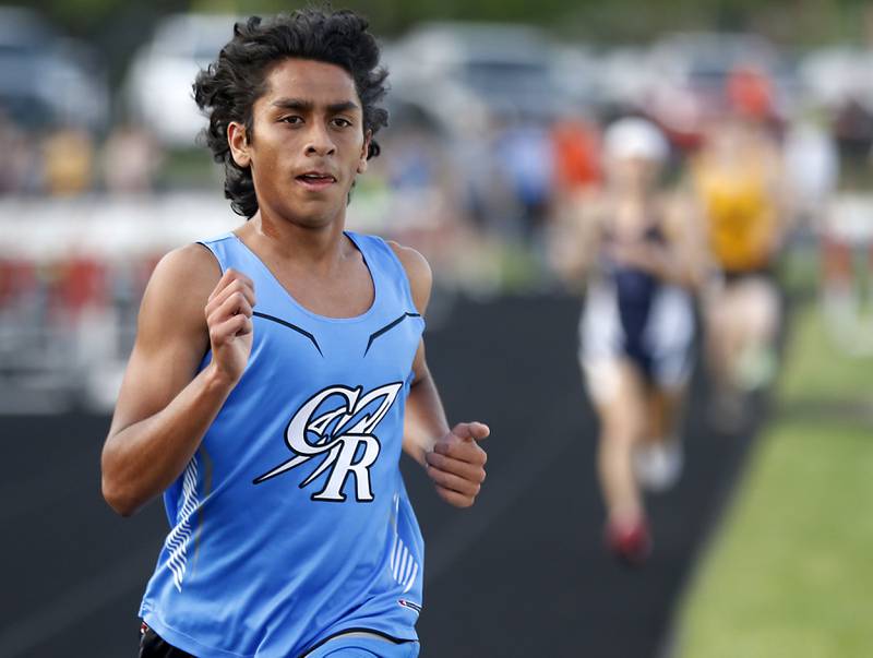 Burlington Central’s Yusuf Baig cruise to victory in the 3200 meter run during Fox Valley Conference boys track and field meet Friday, May 13, 2022, at Crystal Lake Central High School.