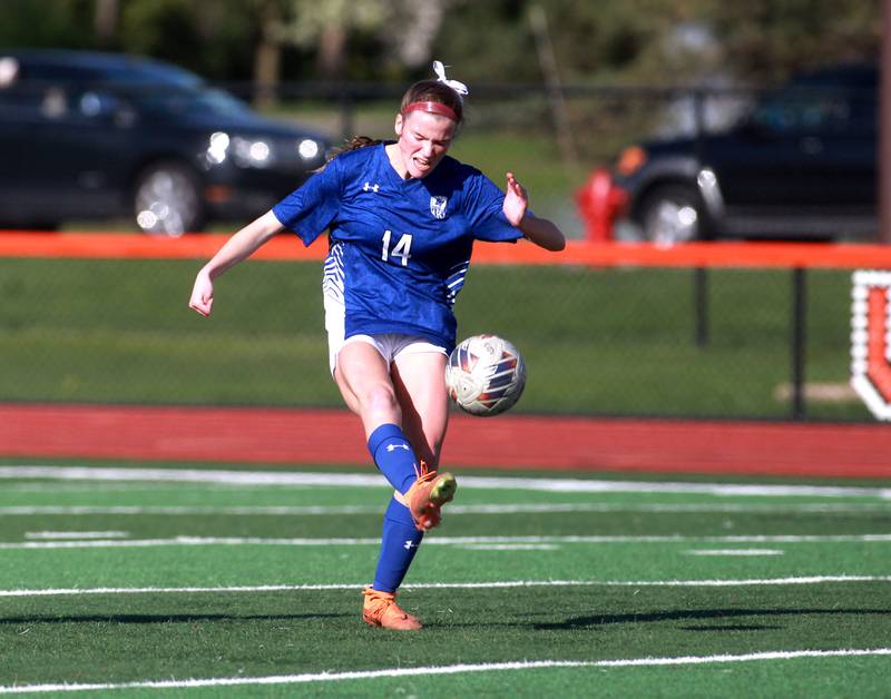 Geneva's Ella Howard kicks the ball during a Tri-Cities Soccer Night game against Batavia on Tuesday, April 29, 2025 at St. Charles East.