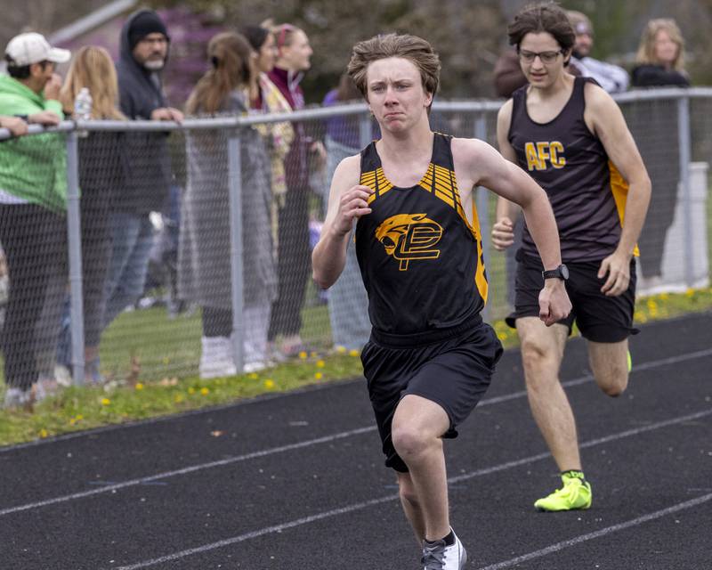 Quincy Smith of Putnam County runs the boys 100 meter varsity heat during the Rollie Morris Invite on April 19, 2025 at Hall High School.