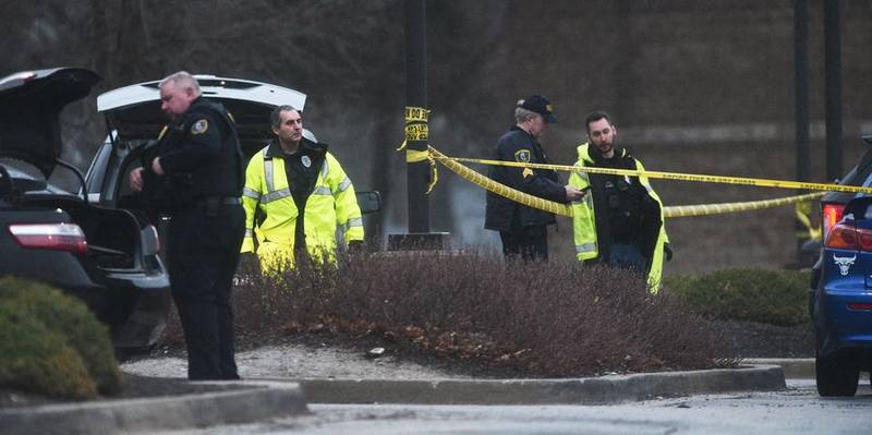 Police work the scene of a fatal shooting the evening of Wednesday, April 13, 2022, in the parking lot of Esporta Fitness on the 400 block of North 8th Street in West Dundee.