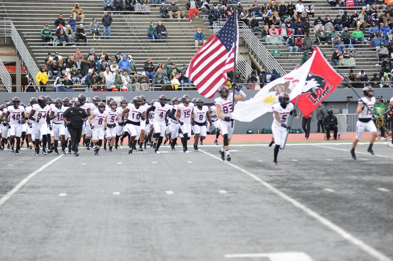 Northern Illinois runs onto the field before the start of Saturday's contest at Eastern Michigan University on Saturday, October 15, 2022.