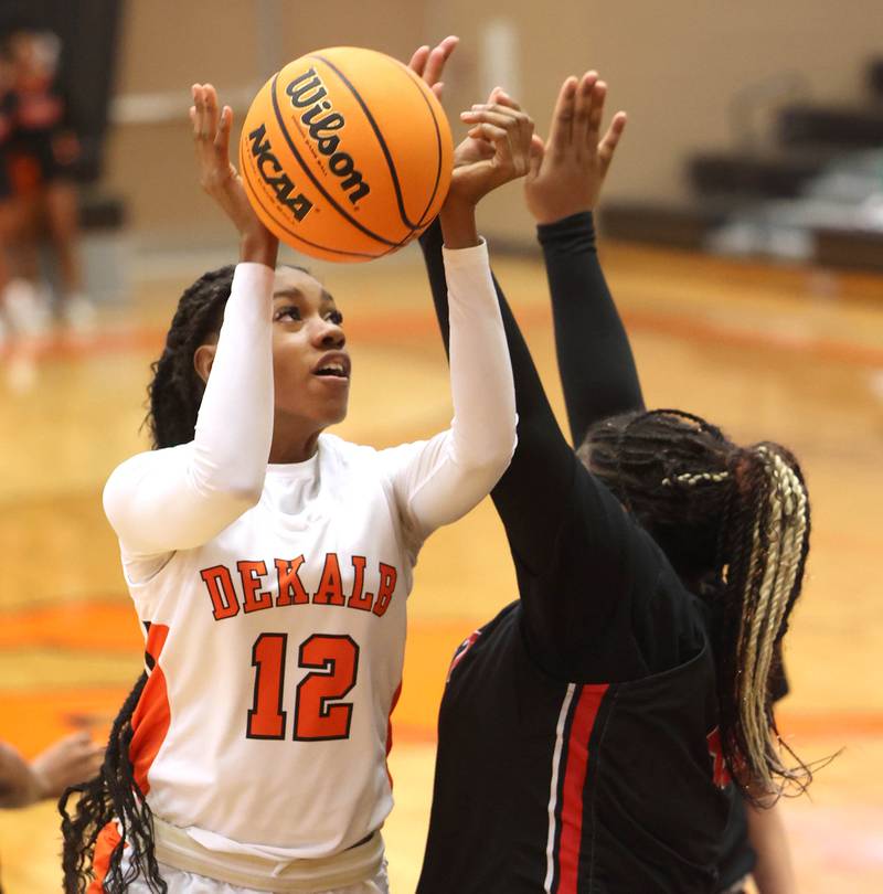 DeKalb's Brytasia  Long shoots over a Rockford East defender during their game Wednesday, Jan. 22, 2025, at DeKalb High School.