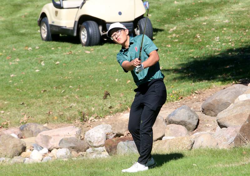 L-P's Adan Chiu swings toward the 18th hole during the Class 2A Regional golf meet on Wednesday, Oct. 2, 2024 at Senicas Oak Ridge Golf Club in La Salle.