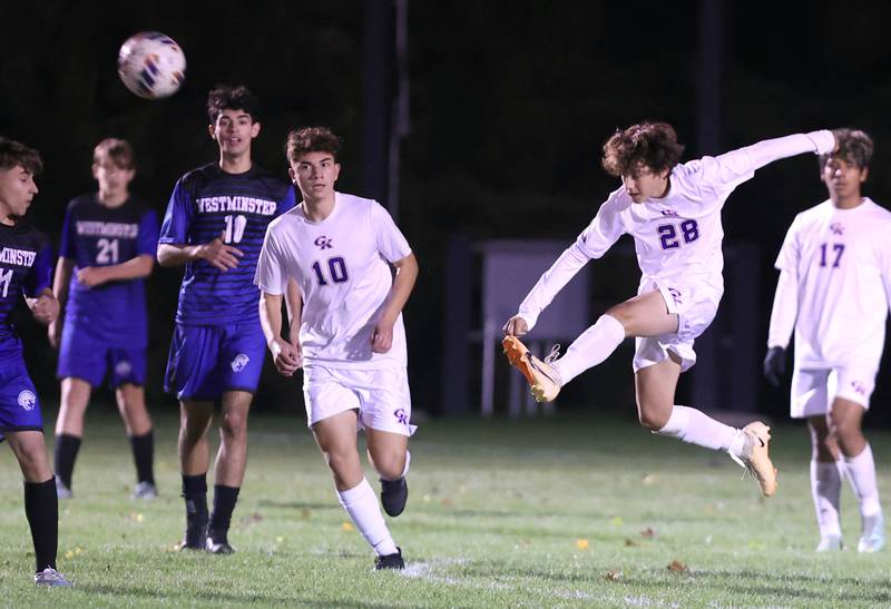 Genoa-Kingston's Ayden Hernandez tears the ball past Westminster Christian players during their Class 1A regional final game Wednesday, Oct. 18. 2023, at Hinckley-Big Rock High School.