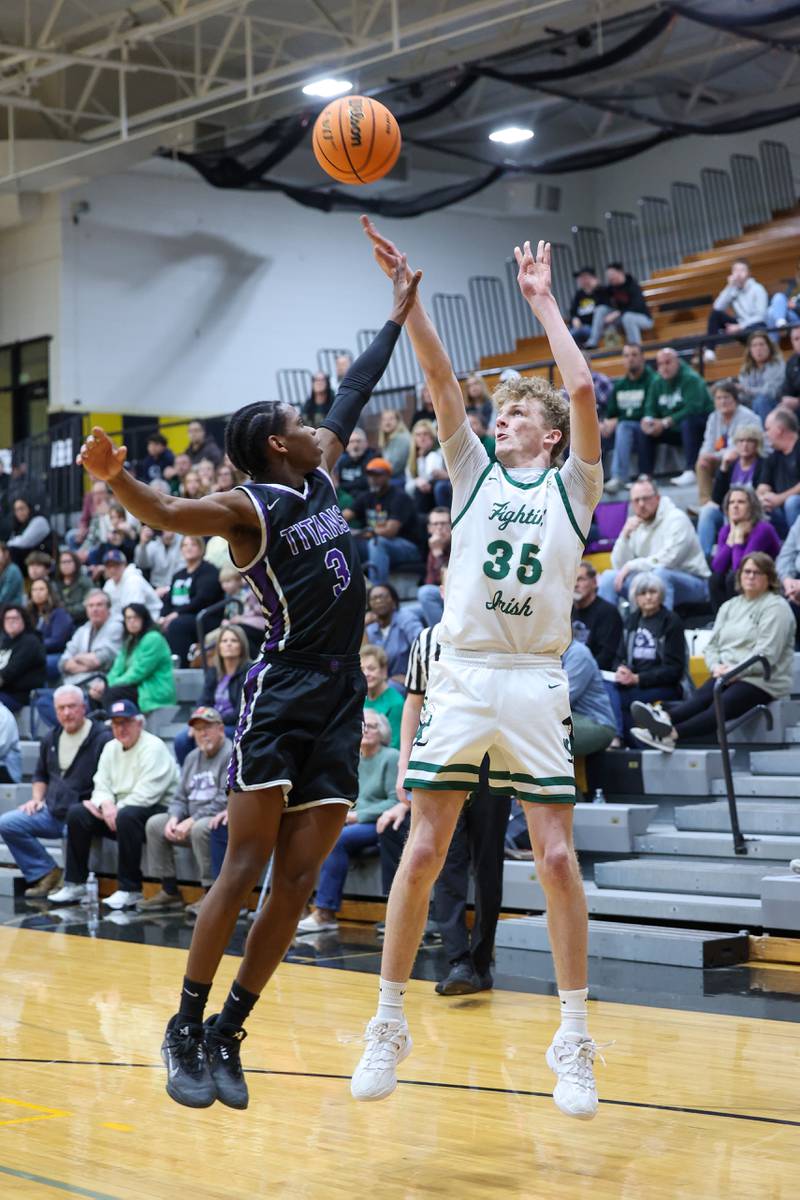 Bishop McNamara's Richard Darr pulls up for a shot during the Fightin' Irish's 66-52 victory over El Paso-Gridley in the IHSA Class 2A Herscher Regional championship on Friday, Feb. 27, 2026.