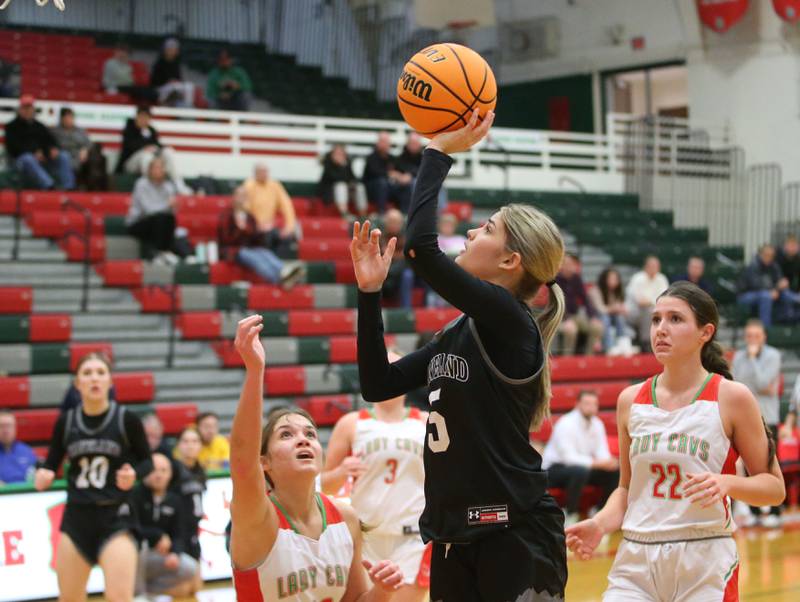 Kaneland's Sophia Rosati lets go of a jump shot over L-P's Phoebe Shetterly on Wednesday, Jan. 15, 2025 in Sellett Gymnasium at L-P High School.