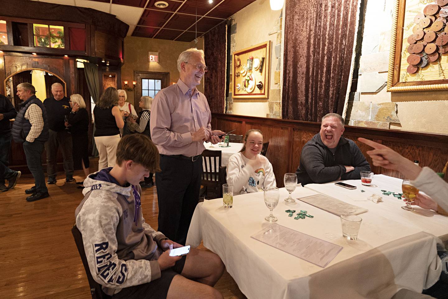 Dixon mayor-elect Glen Hughes laughs with family and supports during his election party Tuesday, April 4, 2023 in Dixon.