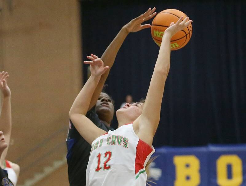 L-P's Phoeby Shetterly shot is blocked by Somonauk's Leah Norris during the Tim Humes Breakout Tournament on Friday, Nov. 22, 2024 at Somonauk High school.