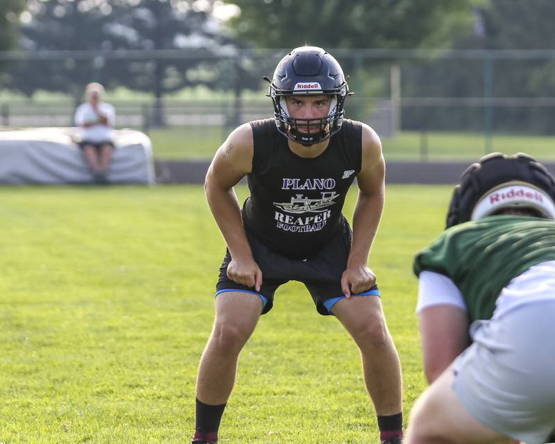 Plano's Kolten Schimandle looks over the offense from the "mike" position during the Kaneland 7 on 7 football tournament, July 22, 2025 in Maple Park.