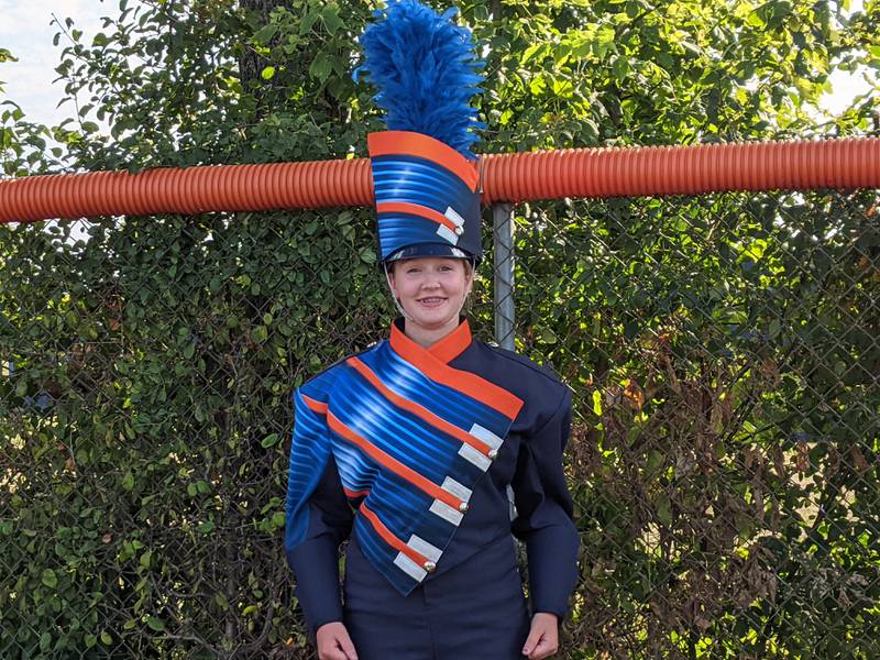 Oswego High School Panther Marching Band member Hannah Rowold likes the fact that she will get to wear a brand new band uniform when playing Sept. 1 at the school’s first home football game of the season.