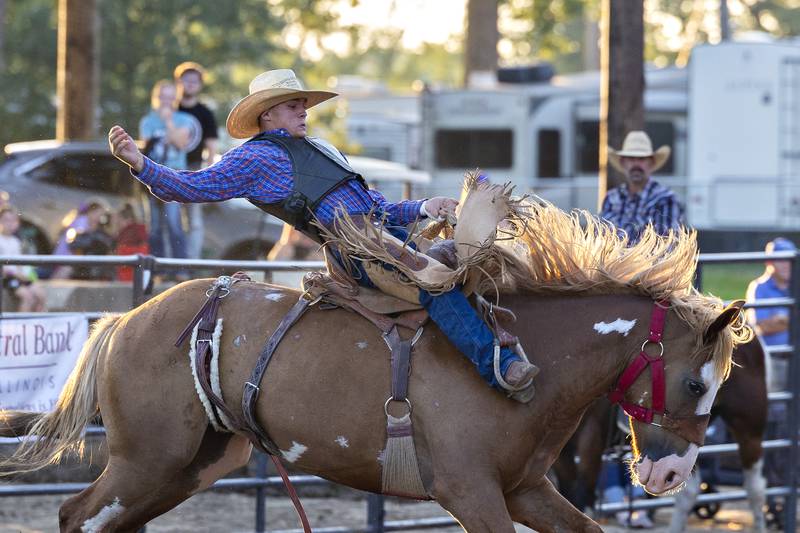 This kite don’t fly as Tripp Kite hangs in there during this ride Wednesday, August 13, 2025, at the Whiteside County Fair during the Next Level Pro Bronc rodeo.