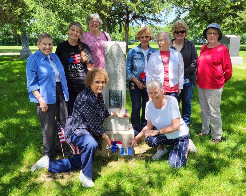 On Memorial Day, members of the Chief Senachwine Chapter, National Society Daughters of the American Revolution, placed flowers at the cemetery locations of people important to the members. So honored were Real Daughter Clarissa McManners, Lt. Peter Wykoff who fought in the Civil War, Elizabeth Wikoff, DAR Daughter, and Elizabeth Wyckoff Dewey, Regent of Christopher Lobingier DAR Chapter. (Kneeling left) are Sharon Bittner and Jean Galetti, (standing left) are Nancy Gillfillan, Annette Lionburger, Carol Byrd, Sandy Miller, Florence Finfgeld, Adelaide Flanigan and Diana Williamson.