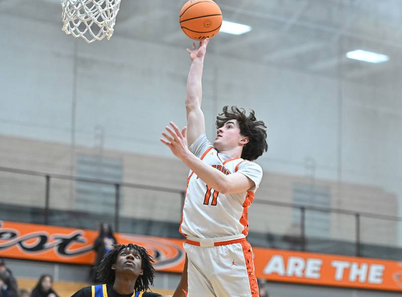 Lincoln-Way West's Ryan Hegji (11) goes up for a shot during the 4A Lockport Regional game against Joliet Central on Monday, FEB. 23, 2026, at New Lenox.